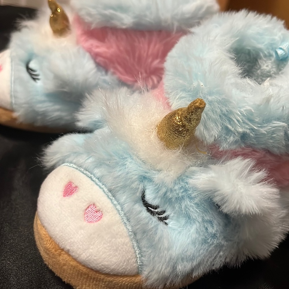The cutest of the cutest unicorn slippers for toddler girl!